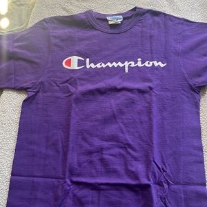 Purple Champion Tee Shirt.